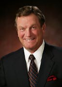 Official profile photo of Rep. Michael Simpson
